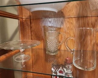 Stand Cake plate, glass pitchers - Inside display cabinet