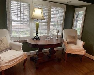 Another view of the Empire table and slipcovered chairs, lamp and Waterford vase and glass footed dish