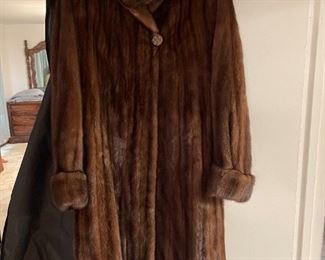 Large selection women costs- small to large size- many faux fur & animal print. 1 real mink coat