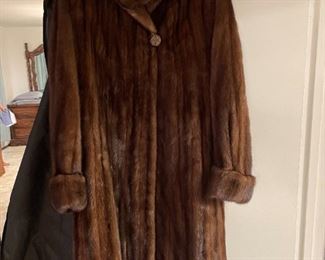 Large selection women costs- small to large size- many faux fur & animal print. 1 real mink coat