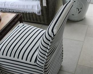 One of two side chairs in immaculate condition in striped fabric. Pair for $300