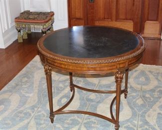 Maitland Smith foyer table (some slight scratches in the leather top that can be refinished. $1,200