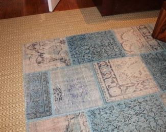 9x12 Sisal mat, $175. Blue area carpet $150