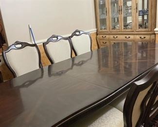 Walnut Dining Table w/8 Chairs and 2 Leafs. Total Length 9ft. x W 48".
