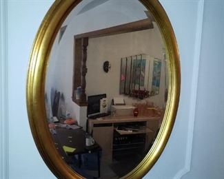 2 oval mirrors 