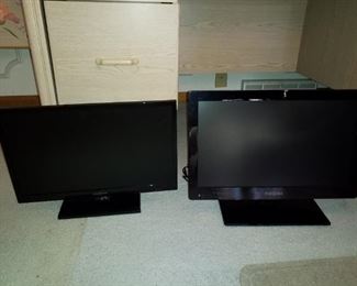 2 small flat screen TVs by Insignia