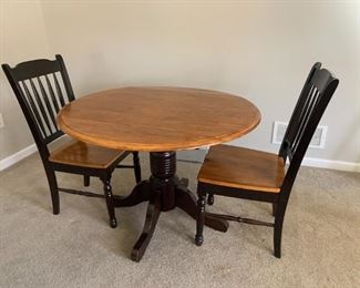 (1) $200 - Drop Leaf Table and 2 Chairs -  table measures 42d or 28d when leaves are dropped.