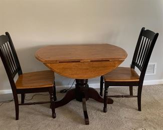 ((1) $200 - Drop Leaf Table and 2 Chairs -  table measures 42d or 28d when leaves are dropped.