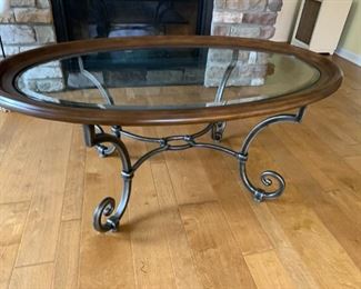 (21) $150  Oval Iron Coffee Table with Glass Top 49w 30d 22h 