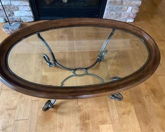 (21) $150  Oval Iron Coffee Table with Glass Top 49w 30d 22h 