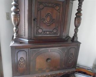 Antique wooden cabinet, looks incredible and offers a ton of storage space