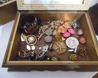 Lots and lots and lots of vintage jewelry and watches.