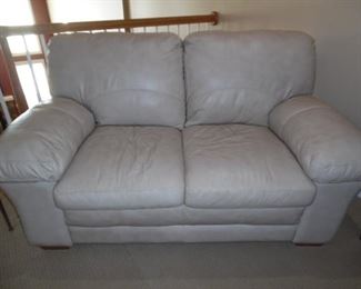 Large comfy white leather loveseat