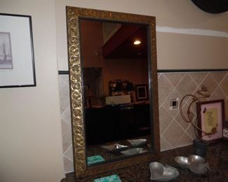 Ornate, beveled mirror