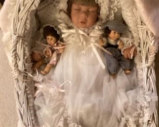 Sleepy baby doll and vintage basket 