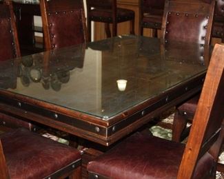 large dining table with 6-leather chairs