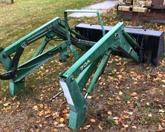 View of front end loader for John Deere tractor 