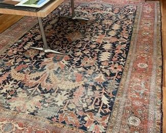 Antique Persian rug, 12' x 8'7" and library table