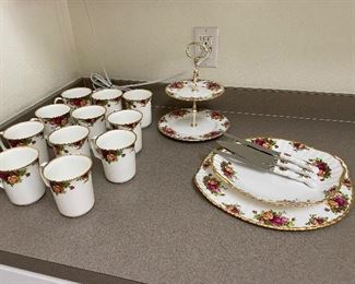 #46 - $125 Royal Albert "Old country Roses" 11 mugs, 2 cake plates, 3 serving pieces, 1 two tiered cake stand