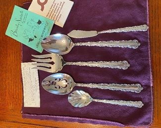 #47 - $100 Oneida Rogers stainless steel, service for 12. 12 dinner knifes, 12 forks, 12 salad or dessert forks, 12 ice tea spoons, 12 tablespoons, 16 tea spoons, 5 serving pieces. in chest. mint condition. 