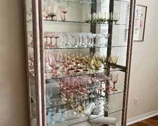 China cabinet. Glass with light