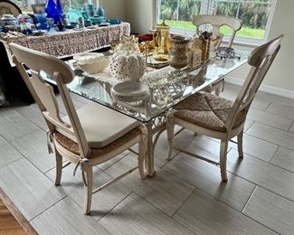 Glass dining table with six chairs