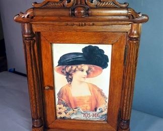 Tin Faced "Kis-Me" Kis-Me Gum Factory Carved Wood Cabinet, Circa 1900, 30" x 20.5" x 18"