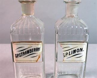 Reverse Glass Label Apothecary Bottles With Stoppers, 10.5" Tall, Qty 2, Including, Sp.Limon And Sp.Strawberry