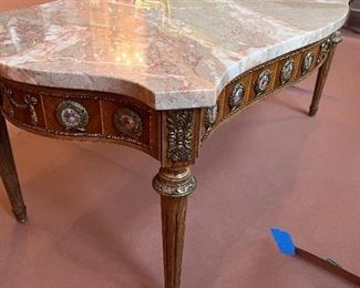 Bronze and Porcelain adorned French style marble top coffee table