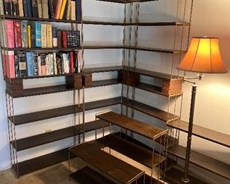 Tin Litho ( wood grain) shelves with 1/4” solid iron square rod frames.   Original Paint the lithography on the tin is in excellent to very good condition.   (1) 2 shelf unit (2) 3 shelf units (6) 4 shelf units.   9 1/4” deep x 30 1/2” long x   14 1/2”- 24 1/2” - 35 1/2” tall.   