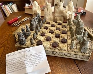  Isle of Lewis Chessmen- Medieval Norway reproduction set with 4 large extra decorative figures.   Chess & Checkers. Heavy stone resin with felt bottoms.  Retail value $295.00 in 1980s.