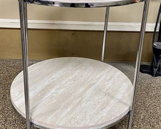 Pair of round white side tables offered for $85 each. 