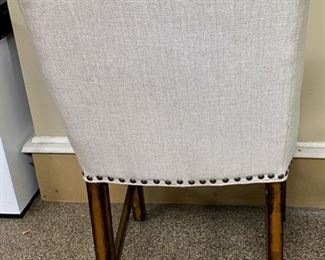 Ivory and brown contemporary chair offered for $75