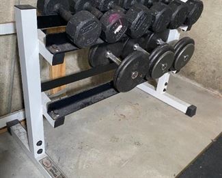 2-tier weight rack offered for $50. Weights: Set of 20lbs for $20, set of 25lbs for $25, set of 30lbs for $30, set of 50lbs for $50.