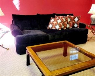 Walter E. Smithe, black cushion sofa. Excellent condition.  Coffee table, glass and brass side tables (LaBarge) 