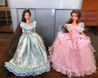 $4.00 for the Lot of 2 Vintage Barbie Doll with Stands(Kaiser) Blue is marked 1990 has shoes, crown, necklace,earrings and ring. Pink is marked Disney NO Shoes. Has a necklce, earrings and ring. Dresses are in good condition. $5.00 for the set. 