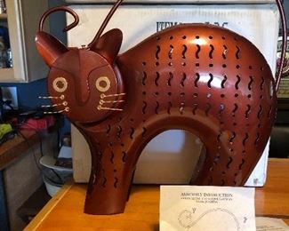 $5.00 each Folk art whimsical metal cat tealight candle holder approx. 11 inches tall.  Tail is not attached in photo. Assembly required.   2 available new in box $5.00 each