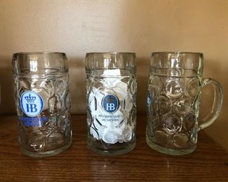 Vintage HB Hofbrauhaus Dimpled Glass Germany Logo Beer Mug very Heavy 32 ounce .  Lot price for the 3 is $6.00 for all. The one that is turned so you can see the handle is like the one it is next to. Blue with the gold around the logo. 