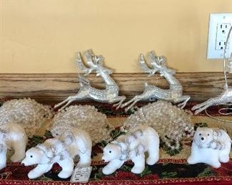 $4.00 for the Lot 3 Glitter Reindeer Ornament New with Tags, 3 Polar Bear Standing Ornament New, 2 Polar Bear Sitting Ornament New, All from the League Shop.  3 strands of Iridescent Bead Garland. 