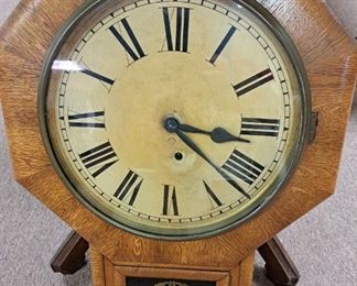 Clocks. Antique oak wall clock