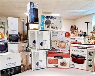Over 50 "New In Box" items!! Kitchenware to outdoor items. Crock Pot, lamps, fans