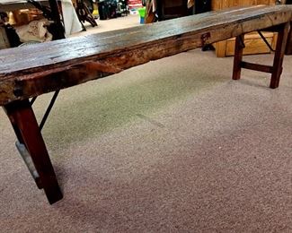 Very cool primitive bench with metal strips