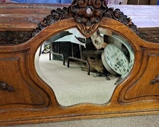 Ornate oak beveled mirror