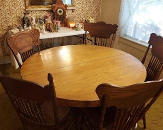 Pedestal Oak table & Pressed back chairs