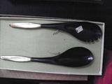 SILVER AND BAKELITE