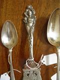 LOVE DISARMED SERVING SPOON