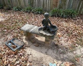 Bench with part of bird bath 