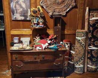 Downstairs - room to left from entrance - Rugs of various sizes - 3 drawer chest, decor