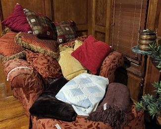 Downstairs - room to left from entrance - Chair with matching ottoman, pillows & quilt, throws