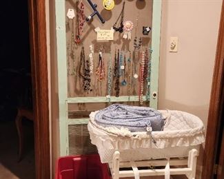 Upstairs bedroom - bassinet, screen door with costume jewelry